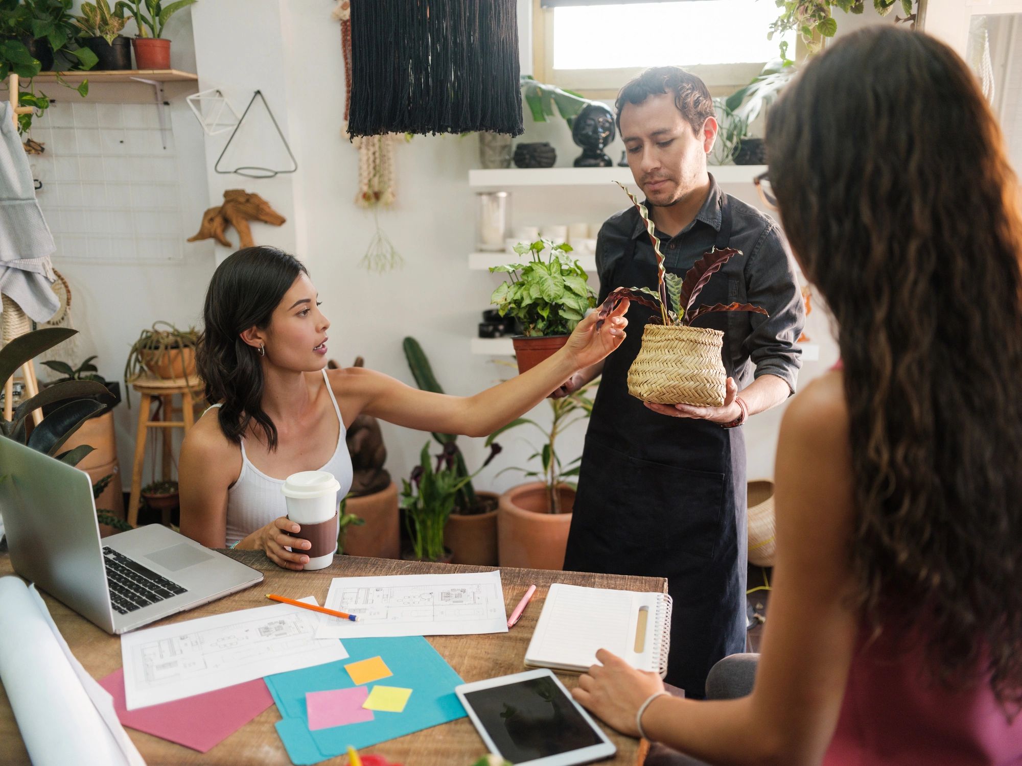 Professionals reviewing property plans together