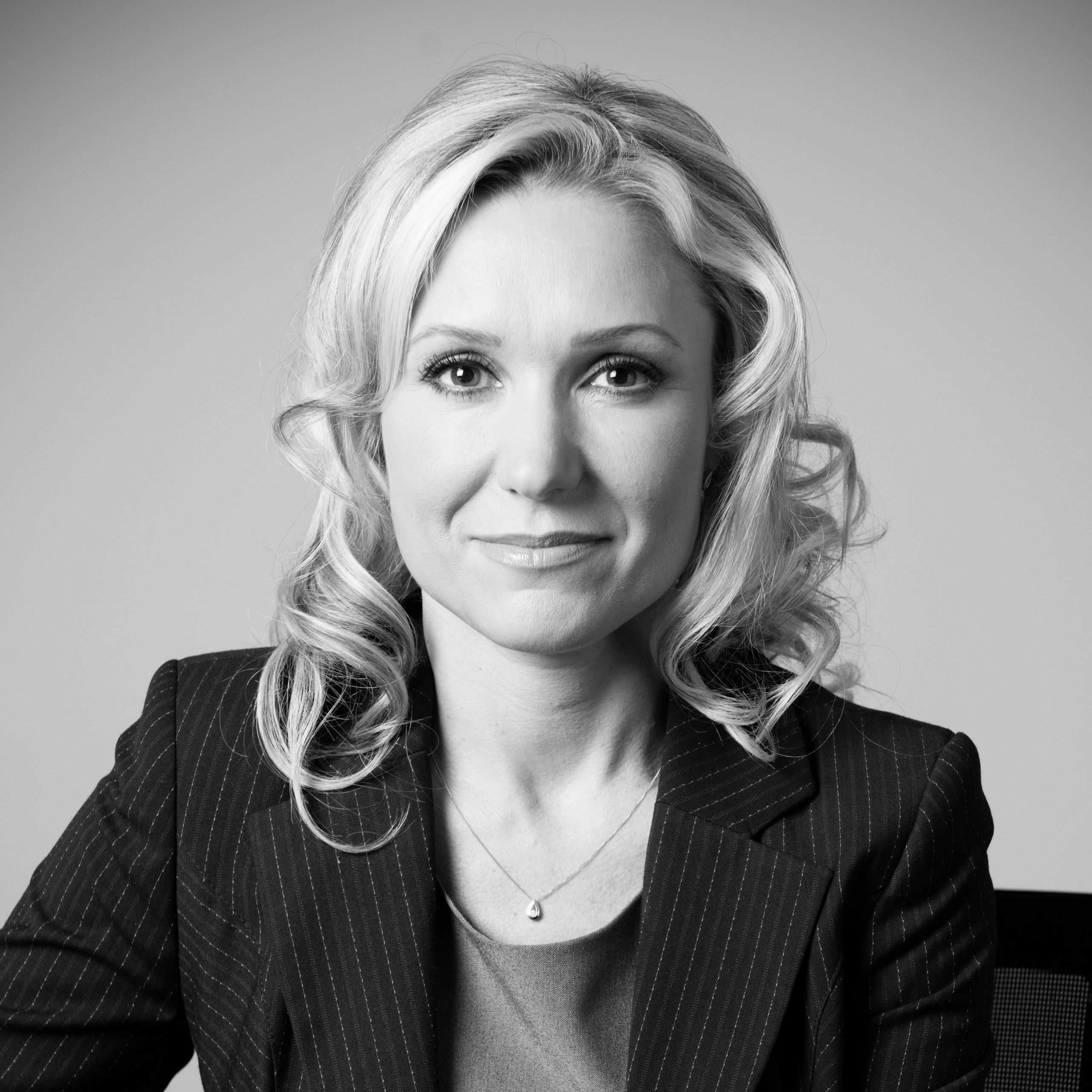 Professional portrait representing content updates policy