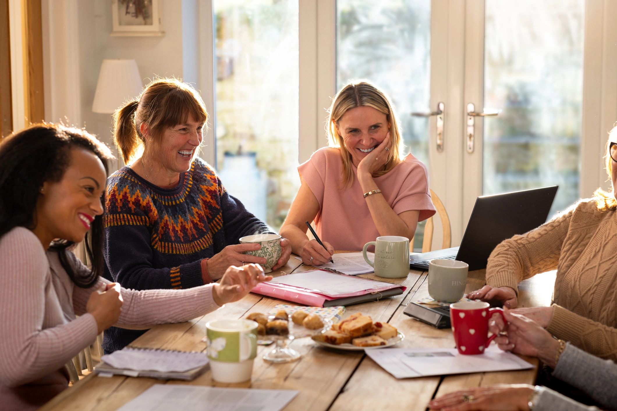 Family discussion around a table representing parenting matters